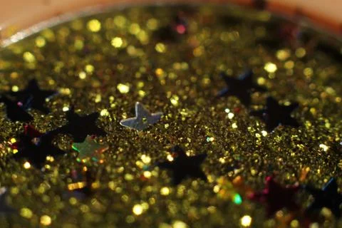 Background of abstract glitter lights. gold, blue red, pink,and black. de foc Stock Photos