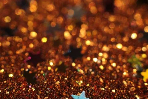 Background of abstract glitter lights. gold, blue red, pink,and black. de foc Stock Photos