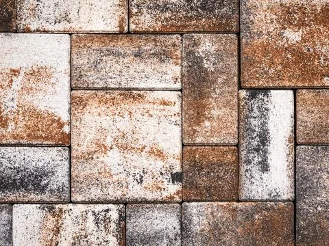 Background of abstract gray-white-rusty paving stones Stock Photos