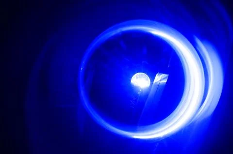 The background is an abstraction of blue circles. 스톡 사진