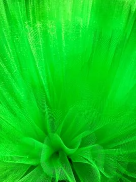 The background is an abstraction of green. Stock Photos