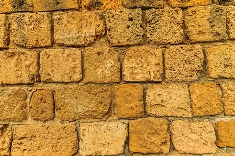 Background of ancient brick wall. Stock Photos
