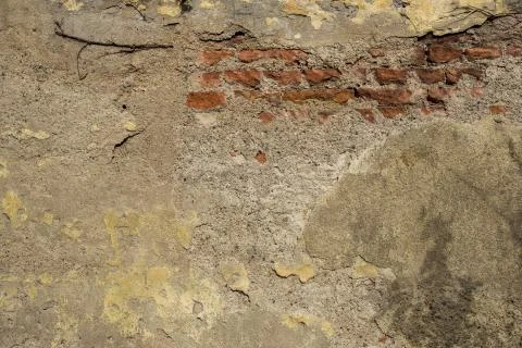 The background of ancient old brick stone at old outdoor wall Stock Photos