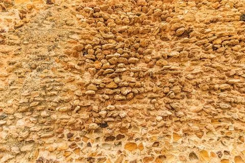 Background of ancient stone wall. Texture of old brick. Stock Photos