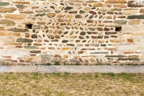 Background of ancient wall built with stones Foto stock