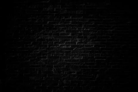 Background and texture black brick stone cladding wall. Stock Photos