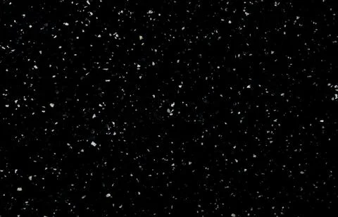 Background and texture of black stone with white crumbs. Modern minimalist Stock Photos