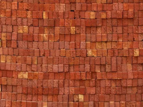Background and texture. Brick wall made of red bricks. Stock Photos