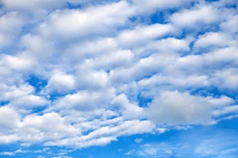 Background and texture of clouds on a blue sky. Freshness and naturalness of  Stock Photos