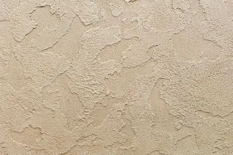 Background and texture of decorative plaster to cover the walls and ceilings. Stock Photos