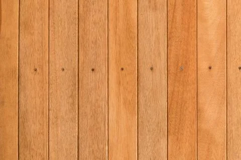 Background and texture of decorative teak wood striped on surface wall Stock Photos