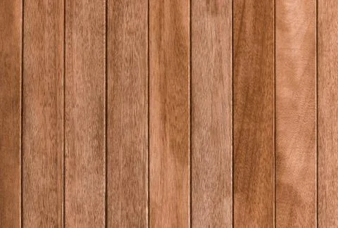 Background and texture of decorative teak wood striped on surface wall Stock Photos