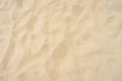 Background and texture, fine beach sand in summer sun Stock Photos