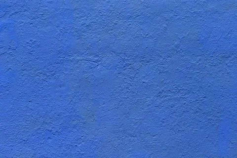 Background and texture of flat thick painted matte blue surface under direct Stock Photos