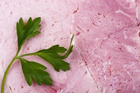 Background and texture of fresh pork ham with parsley closeup Stock Photos