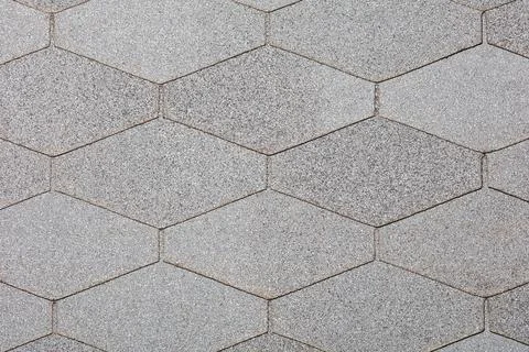 Background and texture of gray diamond-shaped bituminous slabs for arrangin.. Stock Photos