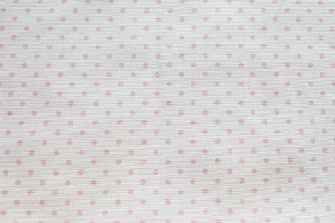 Background and texture light gray cotton fabric with dusty pink polka dots... Stock Photos