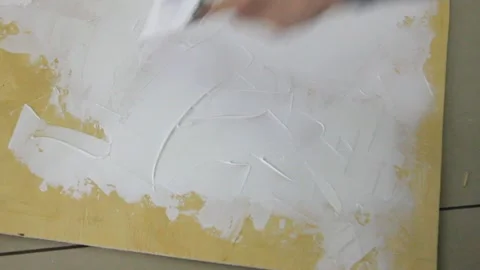 Background and texture a man paints a tree with a brush and paints Stock Footage 239069416