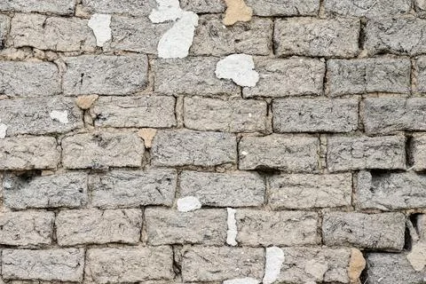 Background and texture of an old wall made of clay and straw Stock Photos