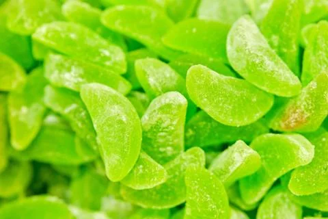 Background and texture of sweets from marmalade green. Stock Photos