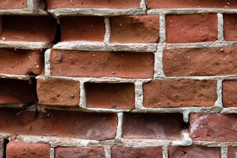 Background of antique brown bricks closeup Stock Photos