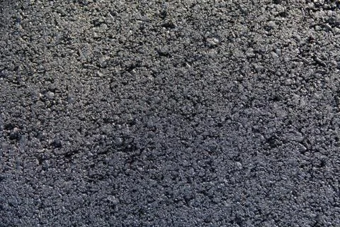 Background - asphalt in sunlight Stock Photos