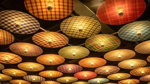 Background, backdrop. Many circular sheets with colors and patterns of lamp. Stock Photos