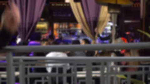 Background Backdrop People Dining At Outdoor Bar Patio Cafe At Night Stock Footage 128064278