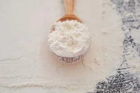 Background for baking - flour sprinkled on the table Stock Photos