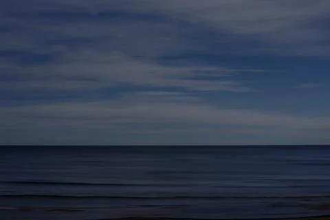 Background of a beach and sky with clouds Stock Photos