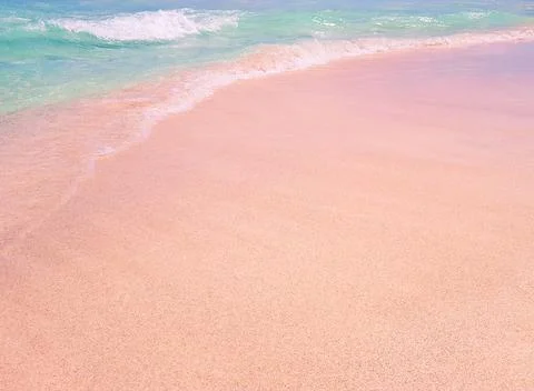 Background beach with sea wave. Texture sand. Gentle pastel colors. Vintage f Stock Photos