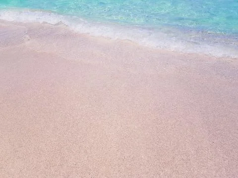 Background beach with sea wave. Texture sand. Gentle pastel colors. Vintage f Stock Photos