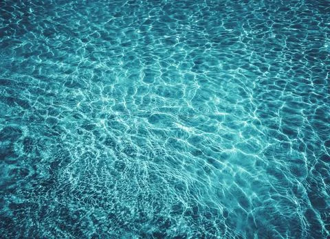 Background beach with sea wave. Texture sand. Gentle pastel colors. Vintage f Stock Photos
