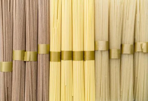 The background of bean cellophane noodles with different toppings. Stock Photos