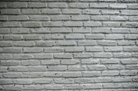 The background is beautiful. An empty city backdrop with brick walls laid aga Foto stock