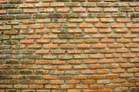 The background is beautiful. An empty city backdrop with brick walls laid aga Stock Photos