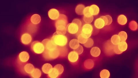 The background is beautiful orange-violet bokeh 4k Stock Footage 280184027