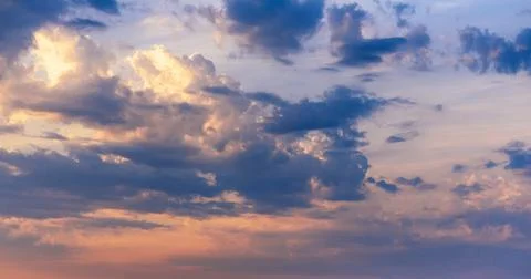 Background with beautiful sky with clouds at sunset in summer Stock Photos