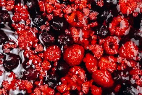 Background of berries jelly raspberry texture. Red berries, macro. Top view,  Stock Photos