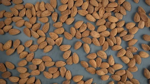 Background of big raw peeled almonds situated arbitrarily Stock Footage 167567991