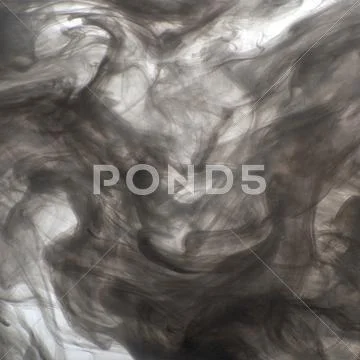 Background of black acrylic paint in water (smoke).. Stock Photos