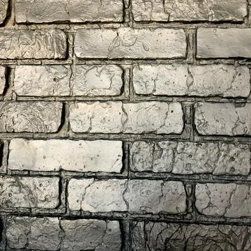 A background of black brick wall Stock Photos