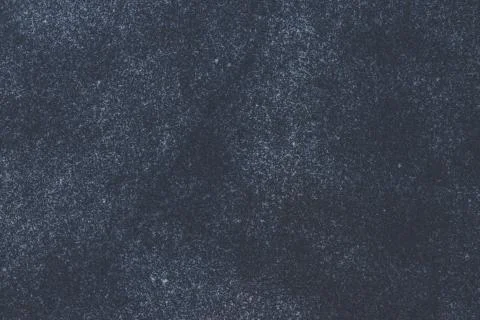 Background of black granite with an interesting texture Stock Photos