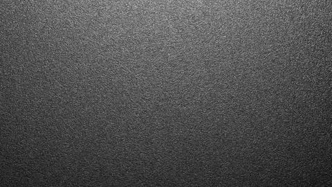 The background is black rough plastic. Stock Photos