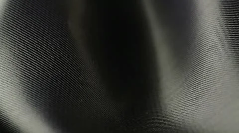 Background of black satin fabric closeup Stock Footage