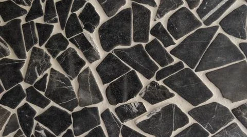 Background black stone texture with white seams variety of geometric mosaic 写真素材