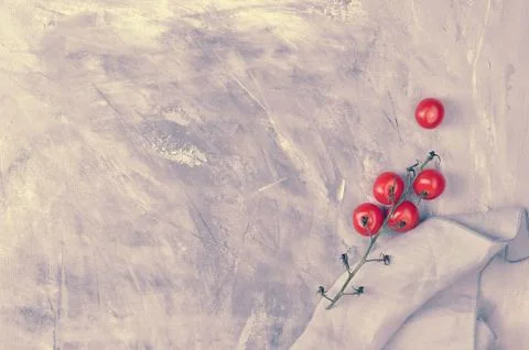 Background with a blank space for text and a branch of cherry tomatoes Stock Photos
