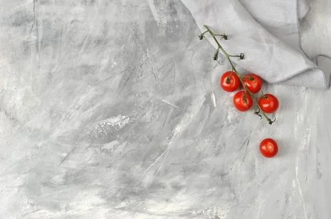 Background with a blank space for text and a branch of cherry tomatoes Stock Photos