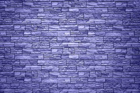 Background of blue bricks. Wall of blue bricks. The texture of the wall. Text Stock Photos