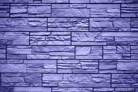 Background of blue bricks. Wall of blue bricks. The texture of the wall. Text Stock Photos